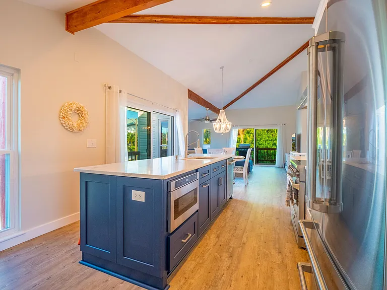 Gourmet kitchen featuring micorwave drawer, SS appliances, huge island with seating for 4.