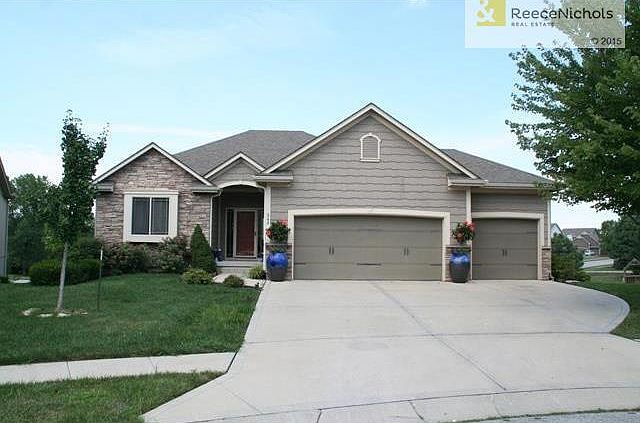 Gorgeous reverse 1.5 story with 3 car garage and walk out basement.