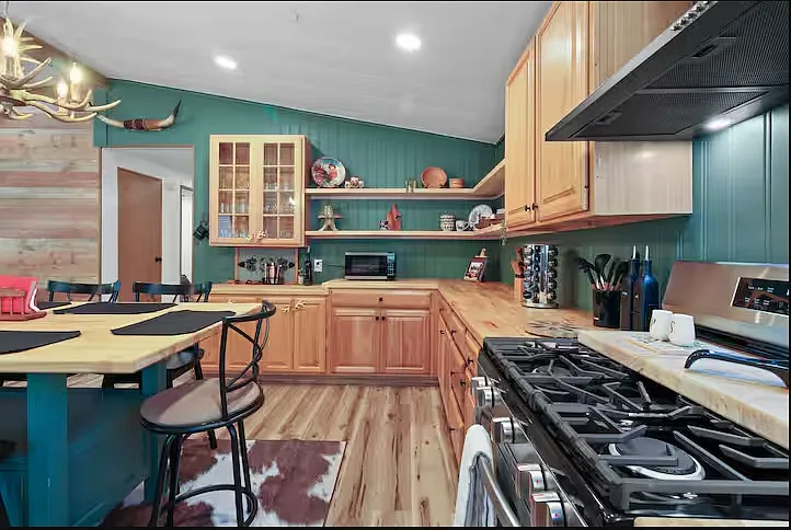 Beautifully remodeled kitchen with all of the amenities you need to cook a home-cooked meal on vacation.