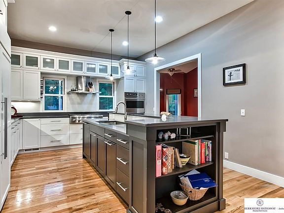Out of this world kitchen, upgraded throughout, counter tops, appliances, cabinets a must see kitchen overlooking the covered de