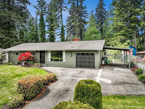 1 car garage and a single carport with lots of additional parking in the driveway and off street parking