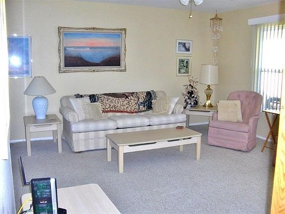 Spacious living room with berber carpet