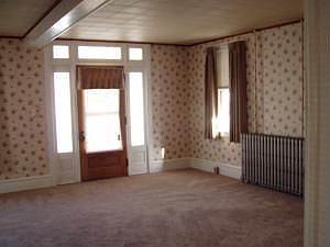 living room with original 1900's wallpaper