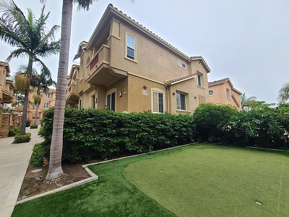 Side of house with community Putting green
