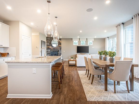 Open Concept Layout Featuring the Kitchen and Cafe Dining Area