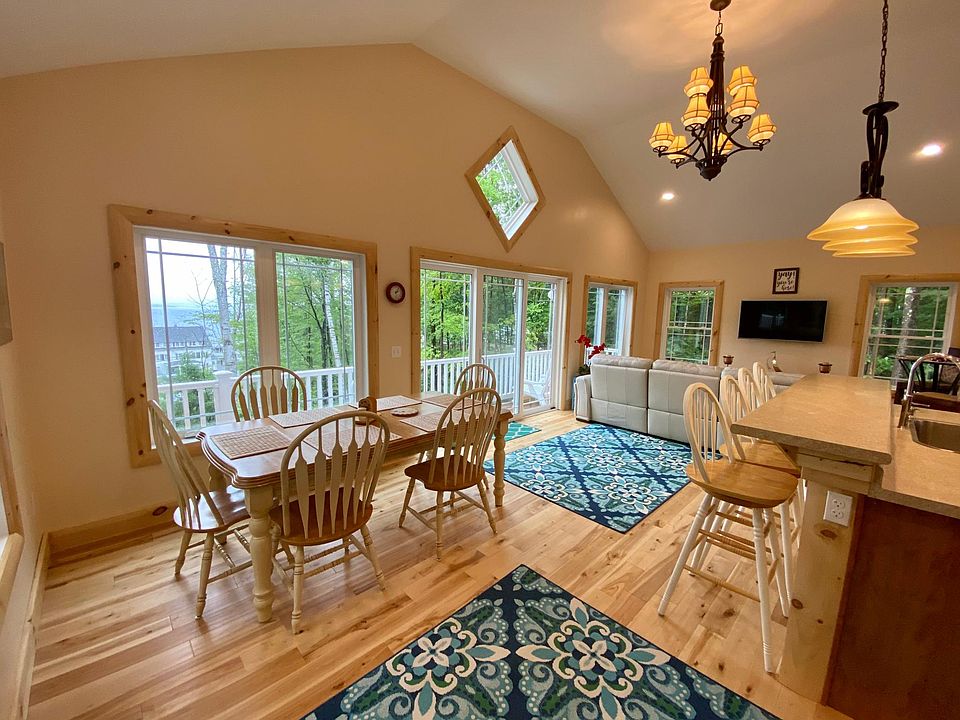 View from entry door of kitchen and family room