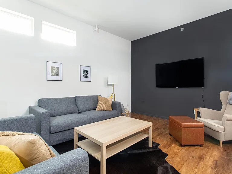 Accent wall painted color is Sherwin Williams color "Iron Ore"....