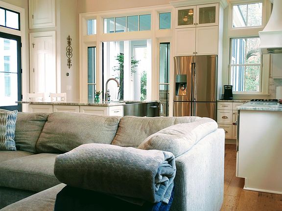 Open Concept Kitchen / Living Room with Powder Room