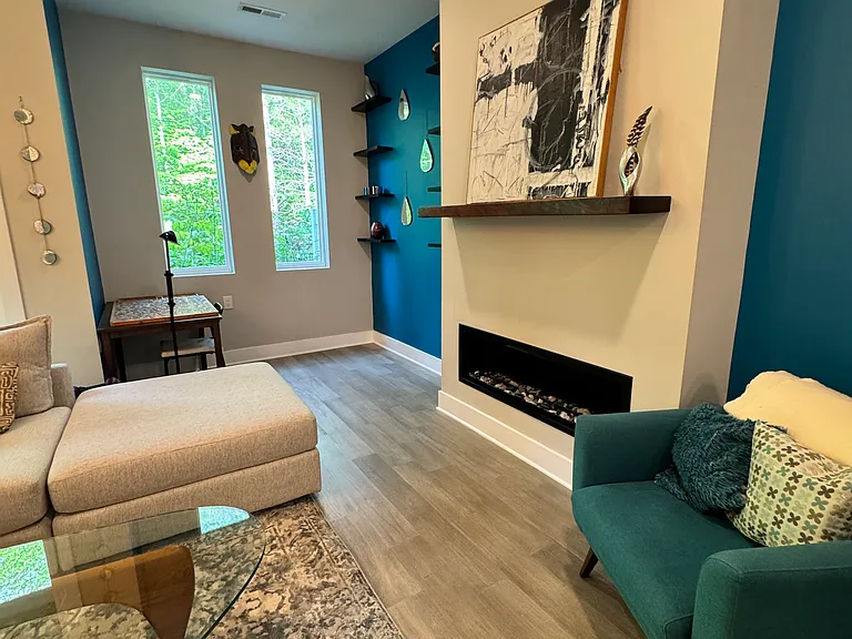 Living Room/Puzzle Nook w/ Fireplace