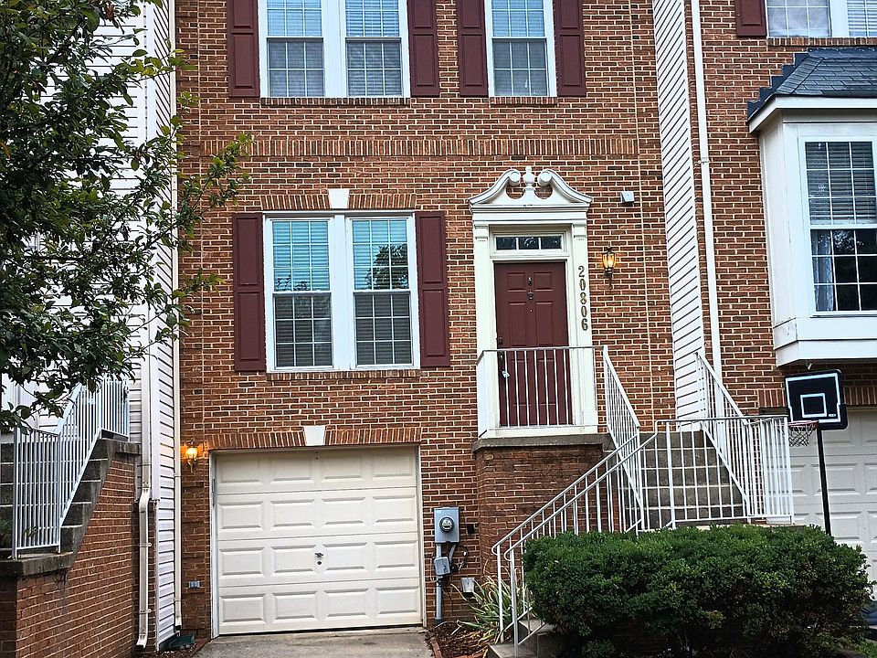 House exterior - garage and driveway parking