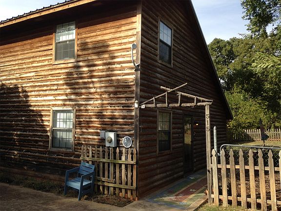 Charming Front door and log cabin siding!
