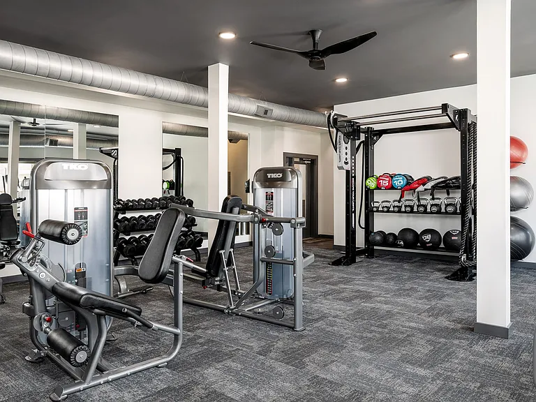 24-Hour Cardio and Strength Training Fitness Center featuring Peloton Bike, Hub Training System, Water Rower, Free Weights and More!