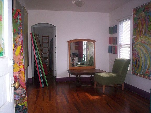 front room off entry.  Kitchen is on the left, two bedrooms in back