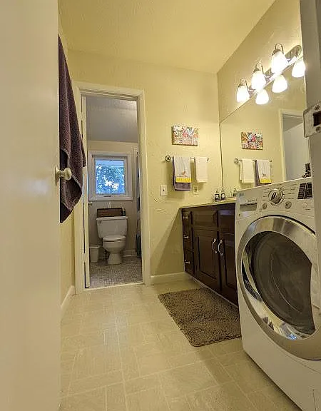Upstairs bathroom 1 with washer