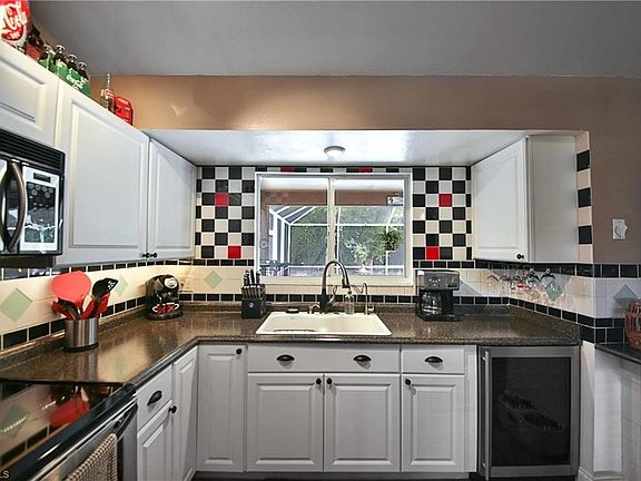 Wine refrigerator included!
