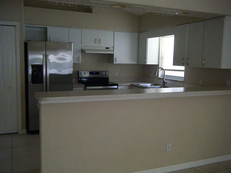 Large Kitchen with new stainless steel appliances and a pantry