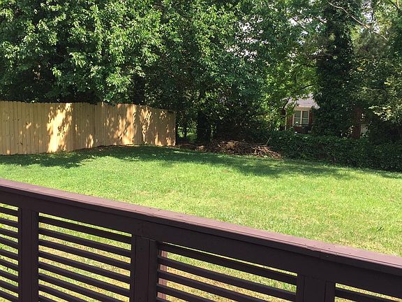 Peaceful back patio, fenced in backyard.