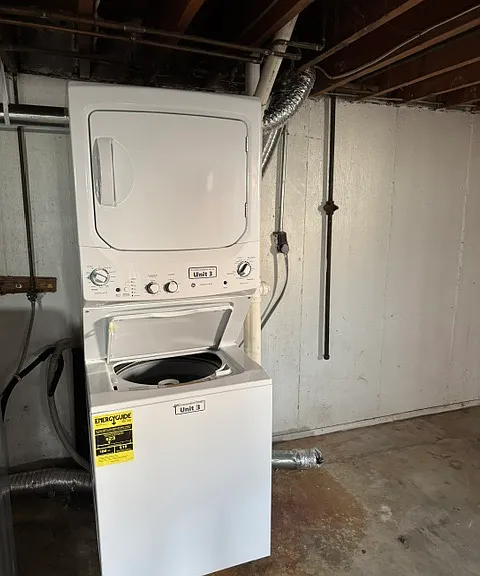 Private laundry stack in basement