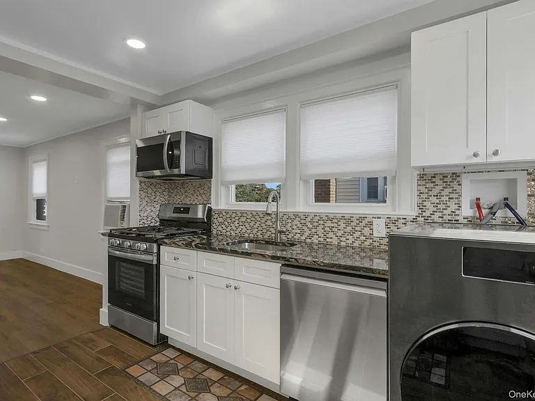 64 Lyons Rd — Photo 13
