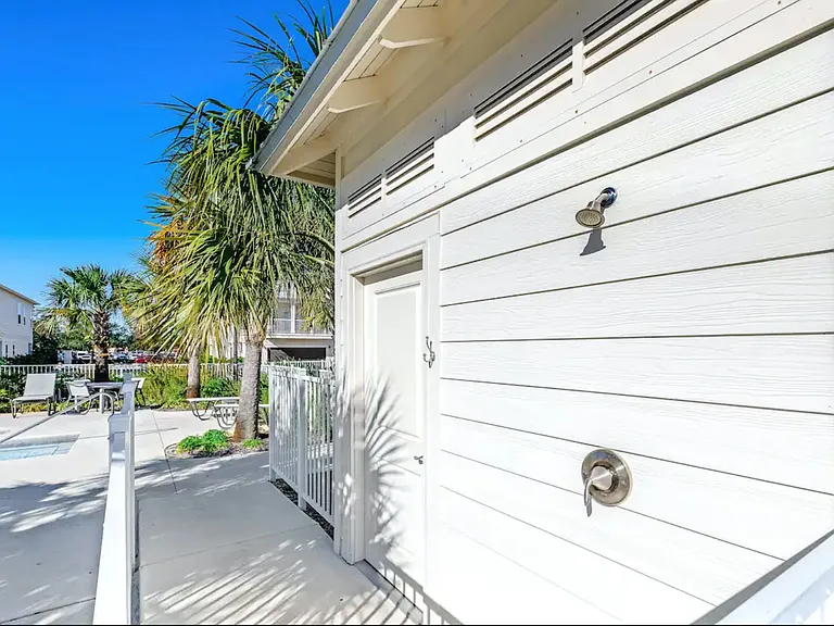 Private, community shower and bathroom at the pool