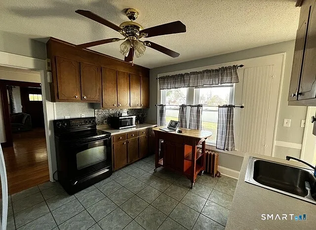 1644 Meriden Ave — Photo 6