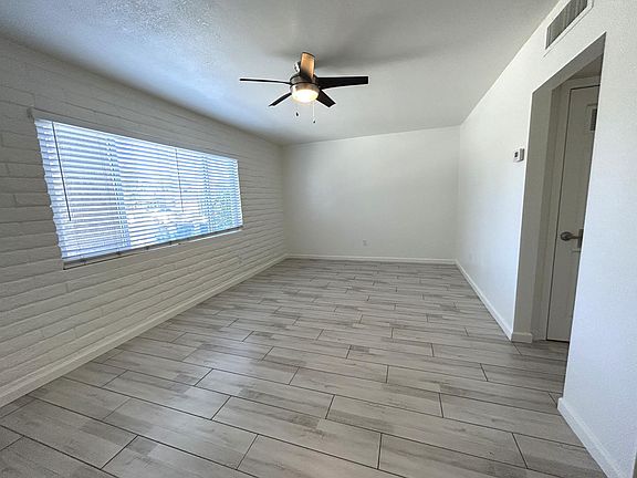 Living area with large windows for great natural light in our 1 bedrooms.