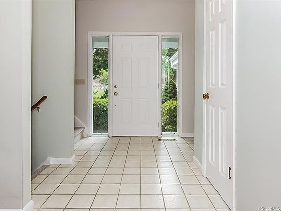 Foyer with coat closet.