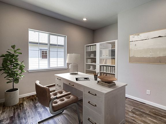 Across the foyer you ll find a second flex space, perfectly suited for an at home office.