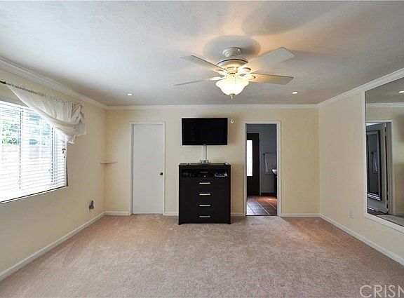 Large Master bedroom with Private Bathroom and wal