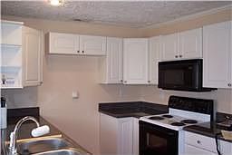 UPDATED KITCHEN! Who doesn't want new appliances and cabinets and counters? St