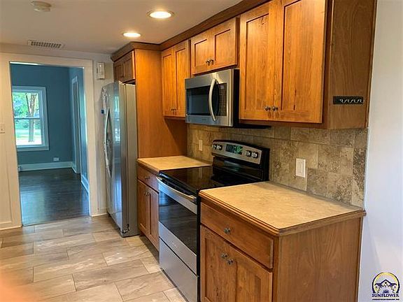 Modern kitchen range and microwave.