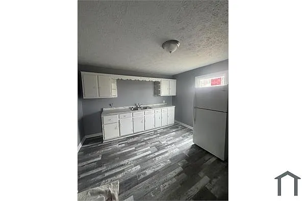 Building Photo - 7006 Textile Ave #2