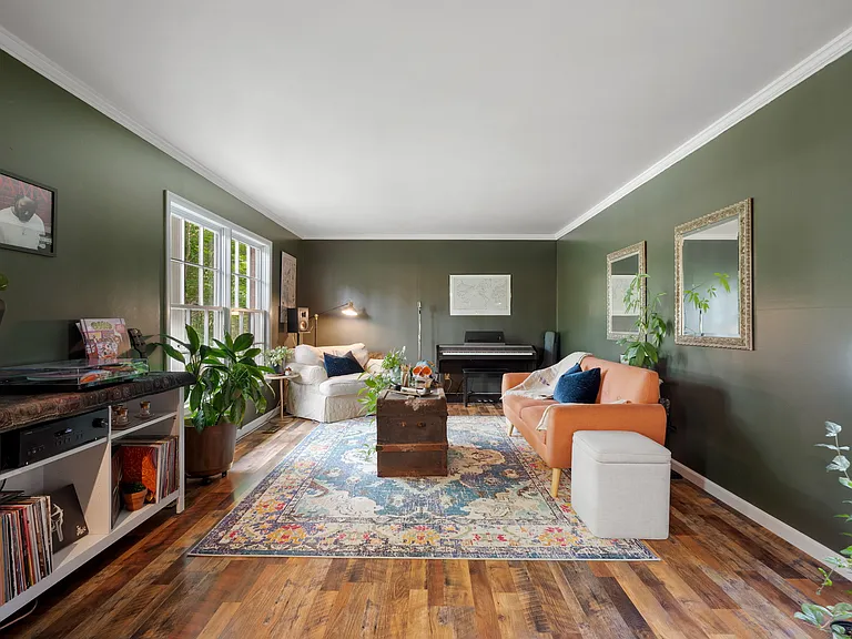 Sitting room, with windows facing front lawn