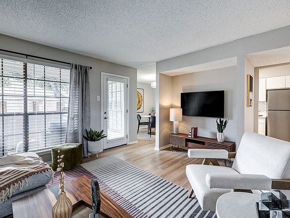 Large Living Room with Gorgeous Hardwood Style Flooring