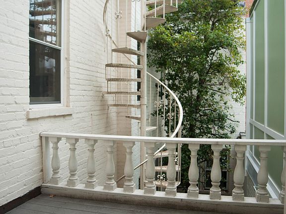 Quaint balcony off dining room