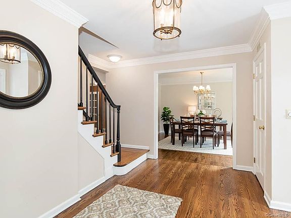 Front hallway with a view into the formal dining room