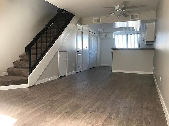 Great view of extra storage under stairwell and powder room