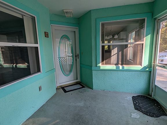Side B Entrance in Breezeway enclosure common space