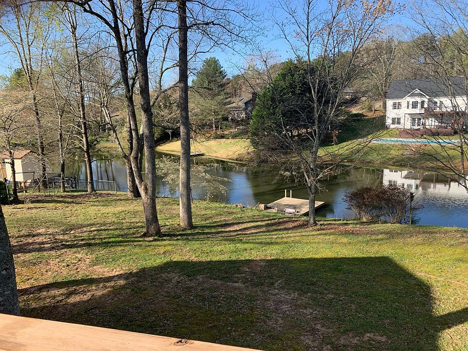 View from deck looking at dock and backyard