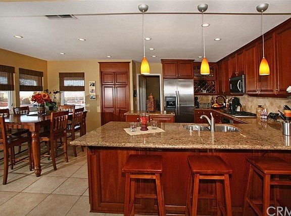 Remodeled kitchen with granite, newer cabinets, stainless appliances, nice size eat in area.