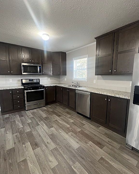 1st image of 534 E 37th Ave Lot 361