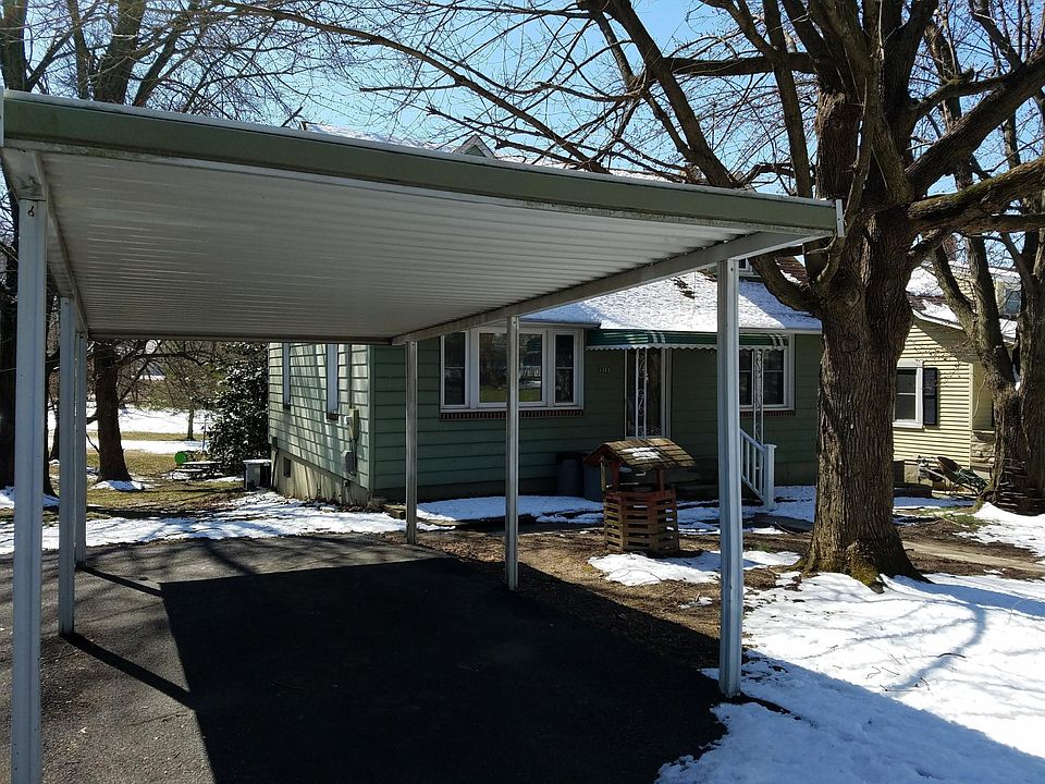 Front of house small carport