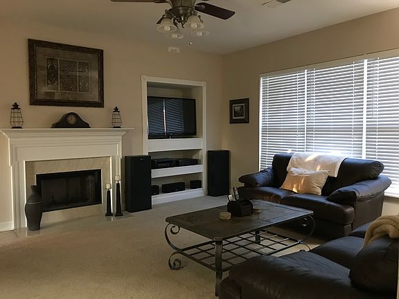 Den with gas fireplace