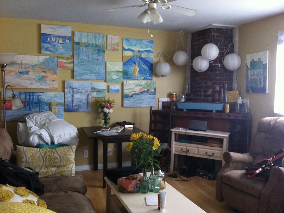 Charming living room with original (non-functioning) brick f