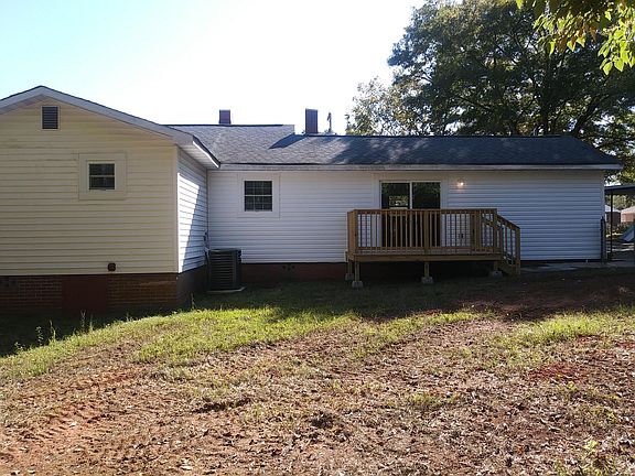 Unit A: Fenced-in Back Yard with a Deck.