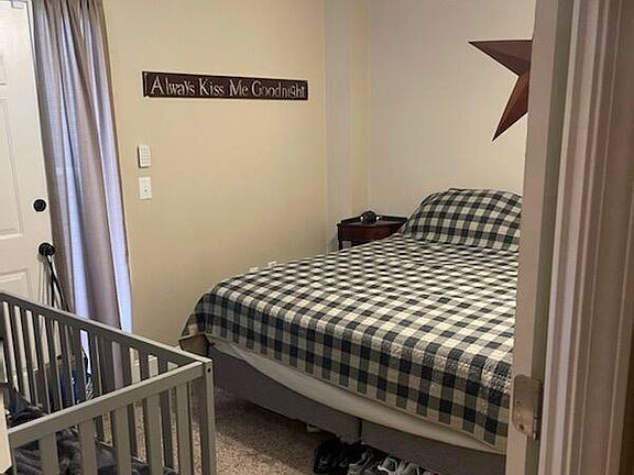 One bedroom has the door to the patio