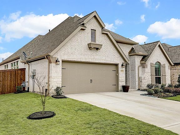 Enjoy the well-manicured yard complete with a sprinkler system. This home has many smart features such as lighting, thermostat, doorbell, and garage door opener.