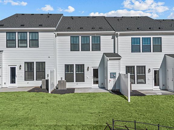 Desirable location and established charm in this superior two-story townhome community near Downtown