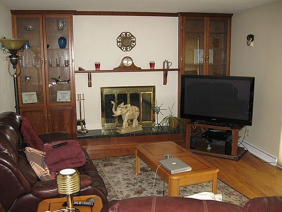 Fireplace with built in shelves