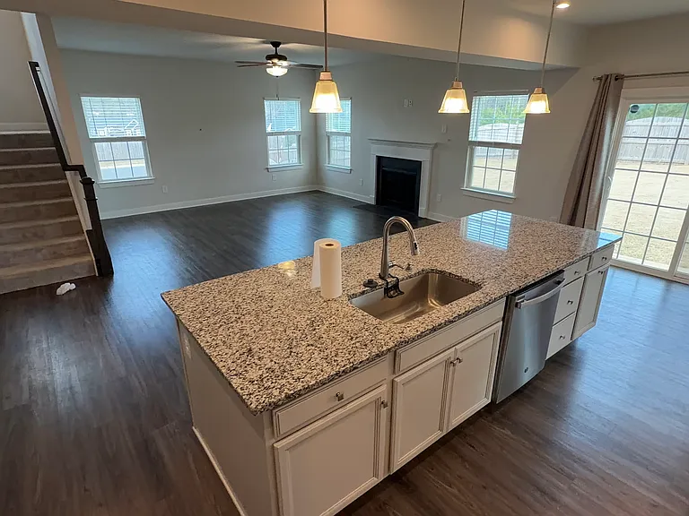 Massive Kitchen with all Stainless Steel Appliances, MASSIVE eat in island, gas range and oven, and more.